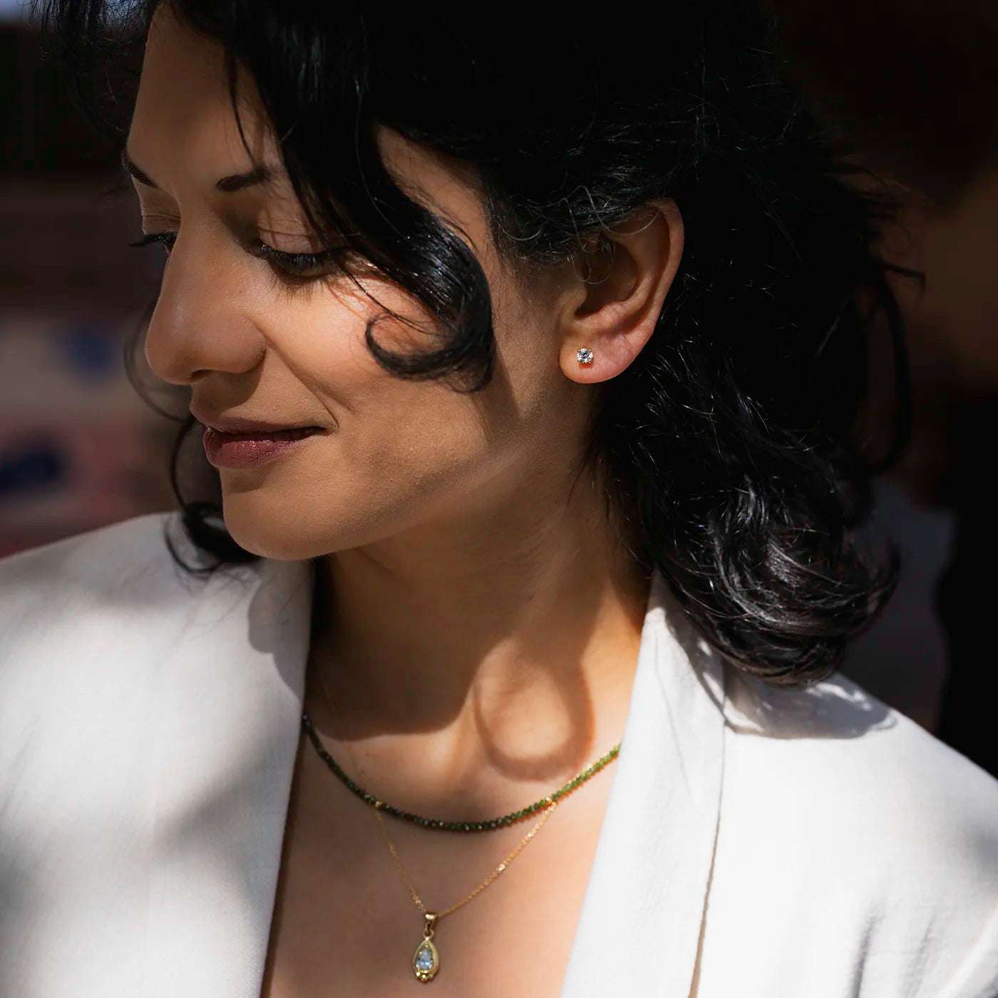 Ei Ohrstecker Petite Fleur 0.30ct Brillant Gelbgold an Modelohr Profilig halb nah