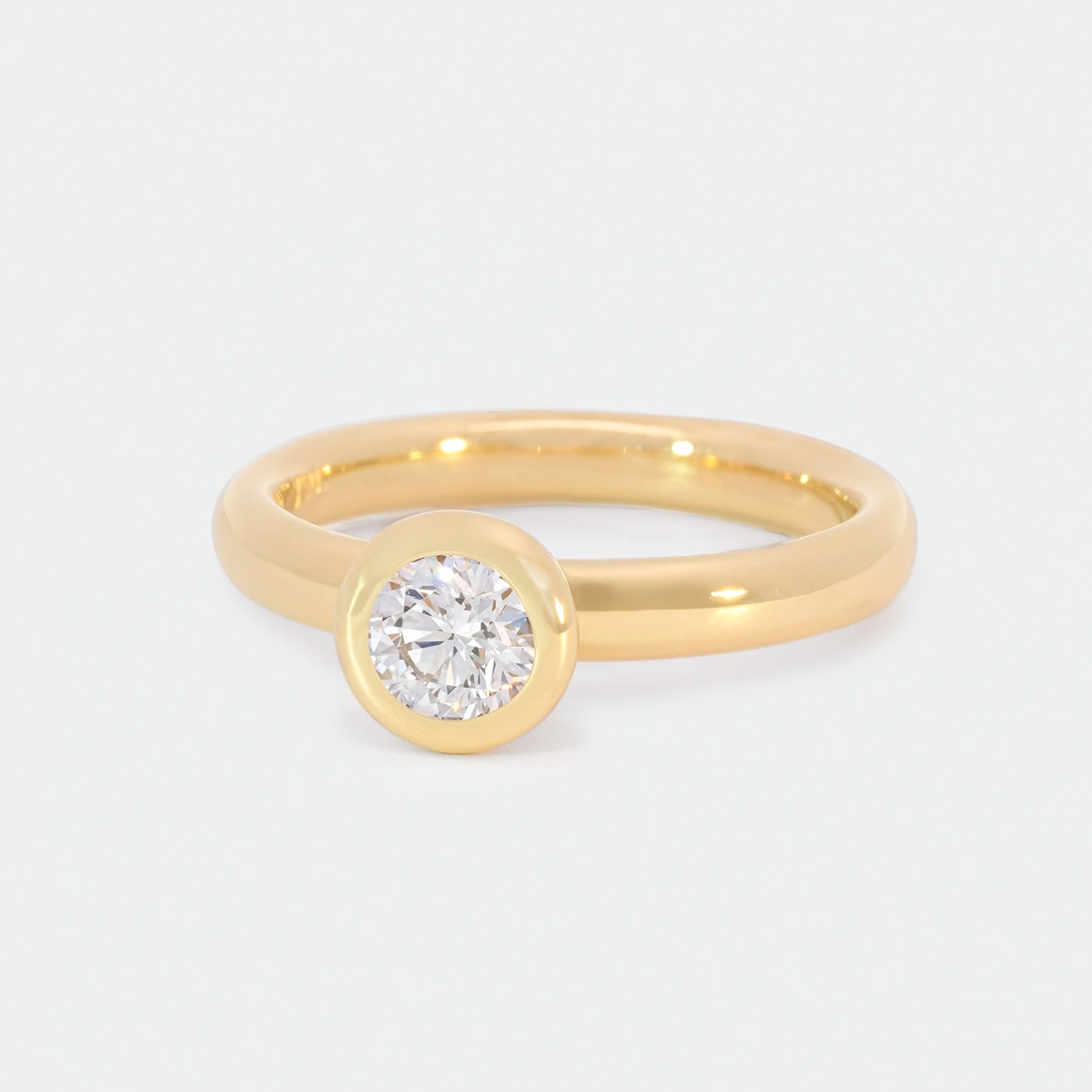 Ring 750er Gelbgold Balance Modell 0.4ct Brillant Frontansicht 25Grad Links gedreht