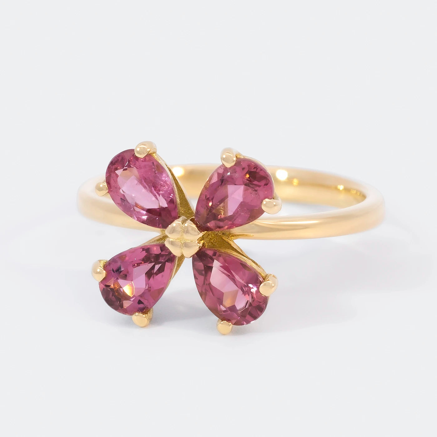 Ring 750er Gelbgold vier rosa Turmaline florales Design Front 25Grad links gedreht