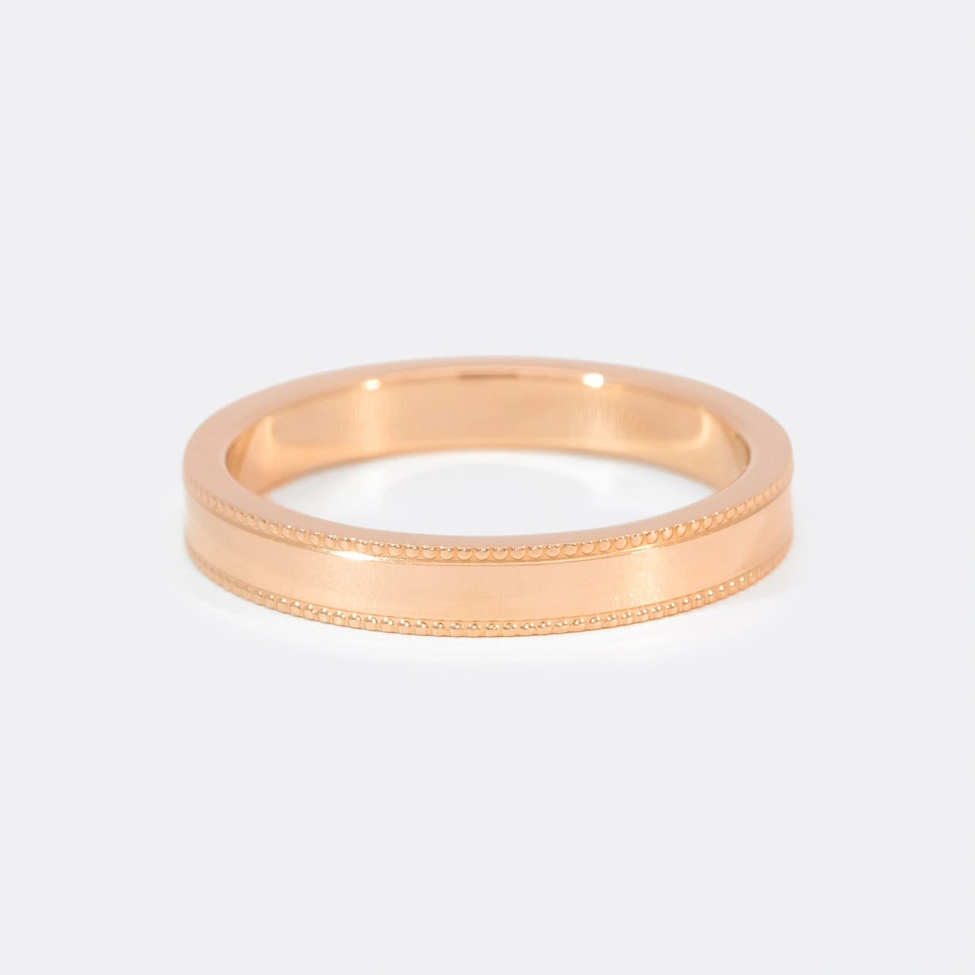 Ring Vintage Damenring Rosegold Ringschiene mit kleinem Kugelmuster am Rand auf beiden Seiten Frontansicht