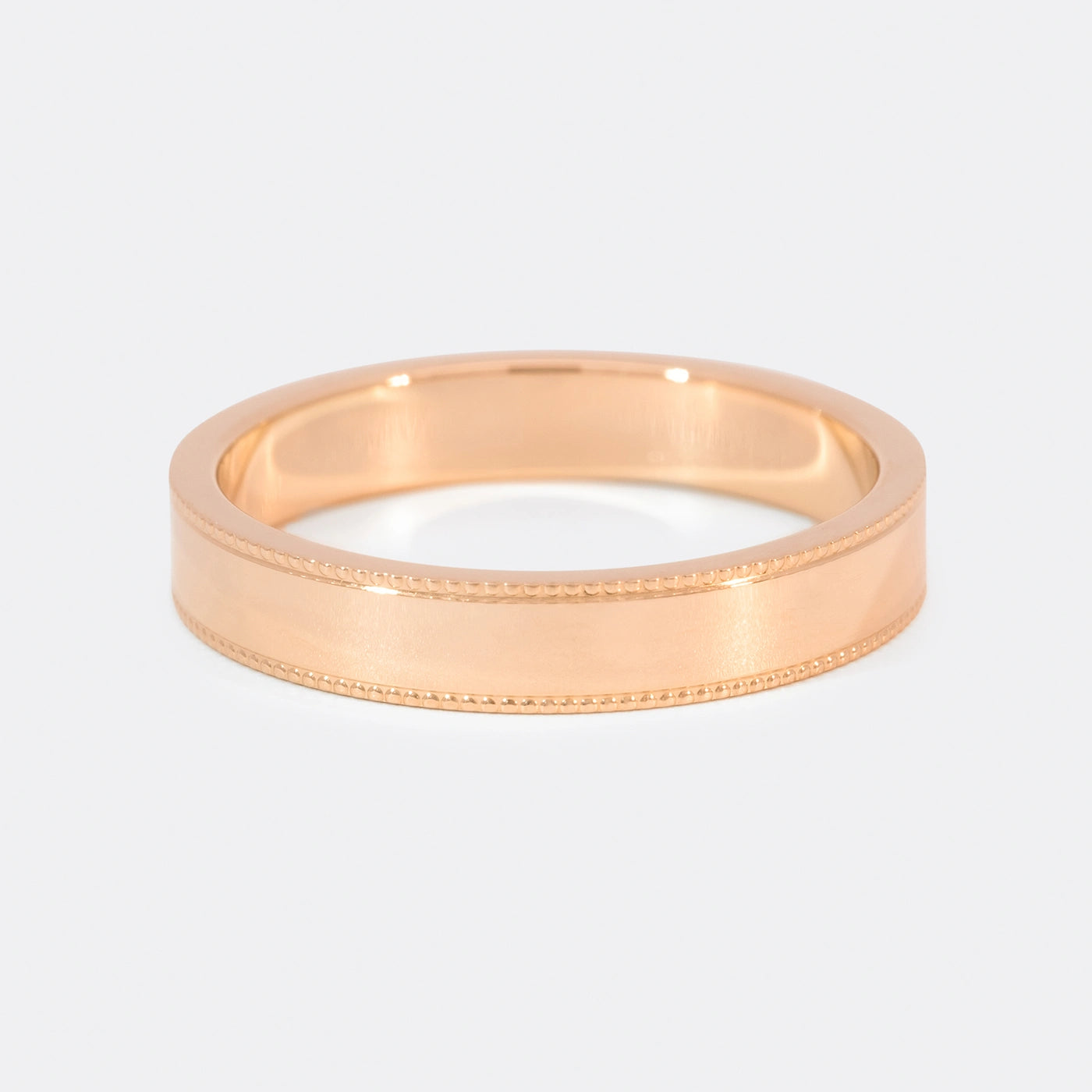 Ring Vintage Herrenring Rosegold Ringschiene mit kleinem Kugelmuster am Rand auf beiden Seiten Frontansicht