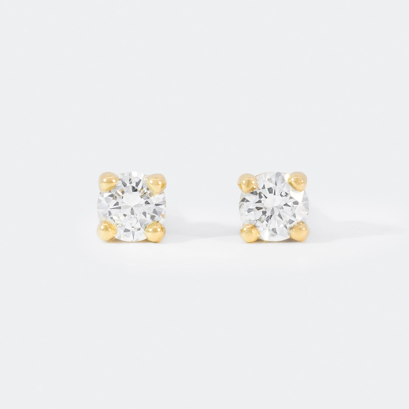 Ohrstecker Petite Fleur je 0.15ct Brillant Gelbgold Frontansicht