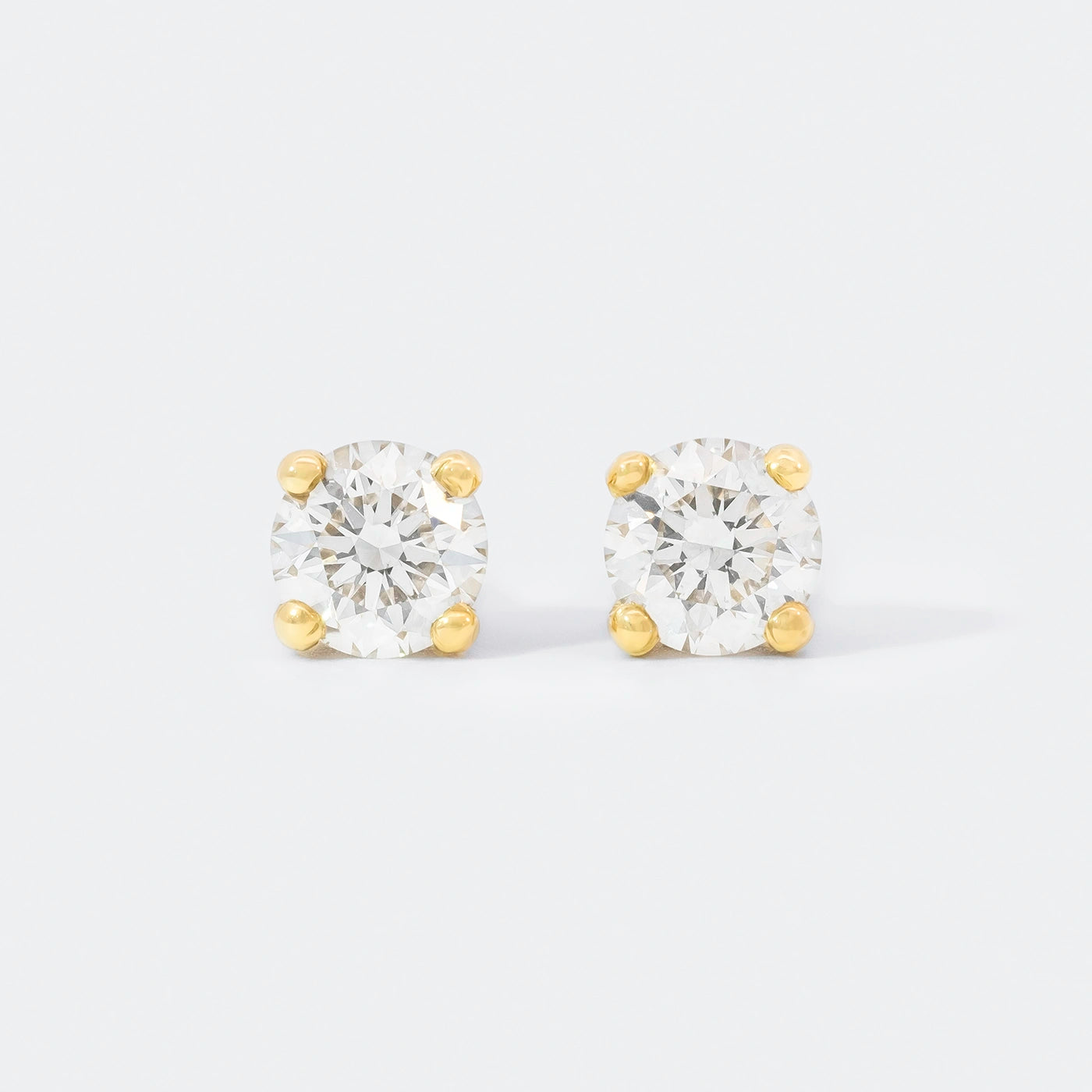 Ohrstecker Petite Fleur je 0.30ct Brillant Gelbgold Frontansicht