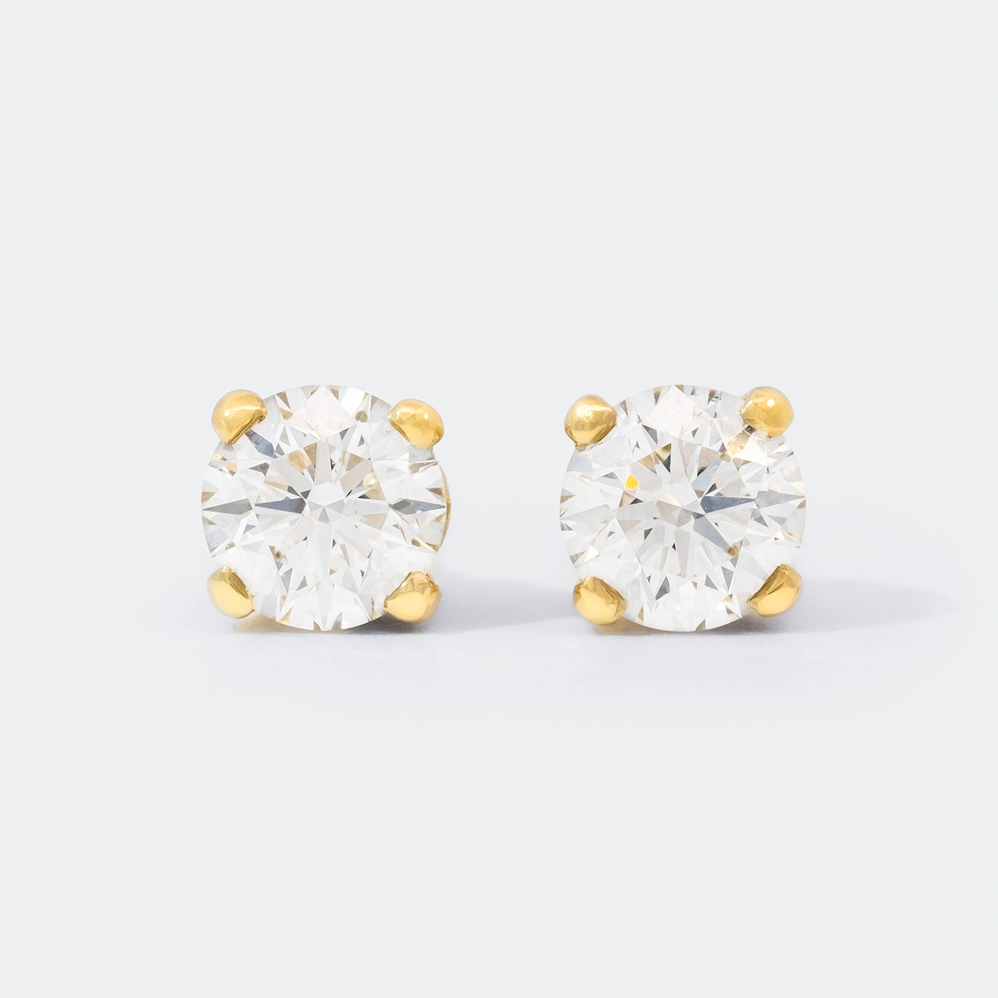 Ohrstecker Petite Fleur je 0.50ct Brillant Gelbgold Frontansicht