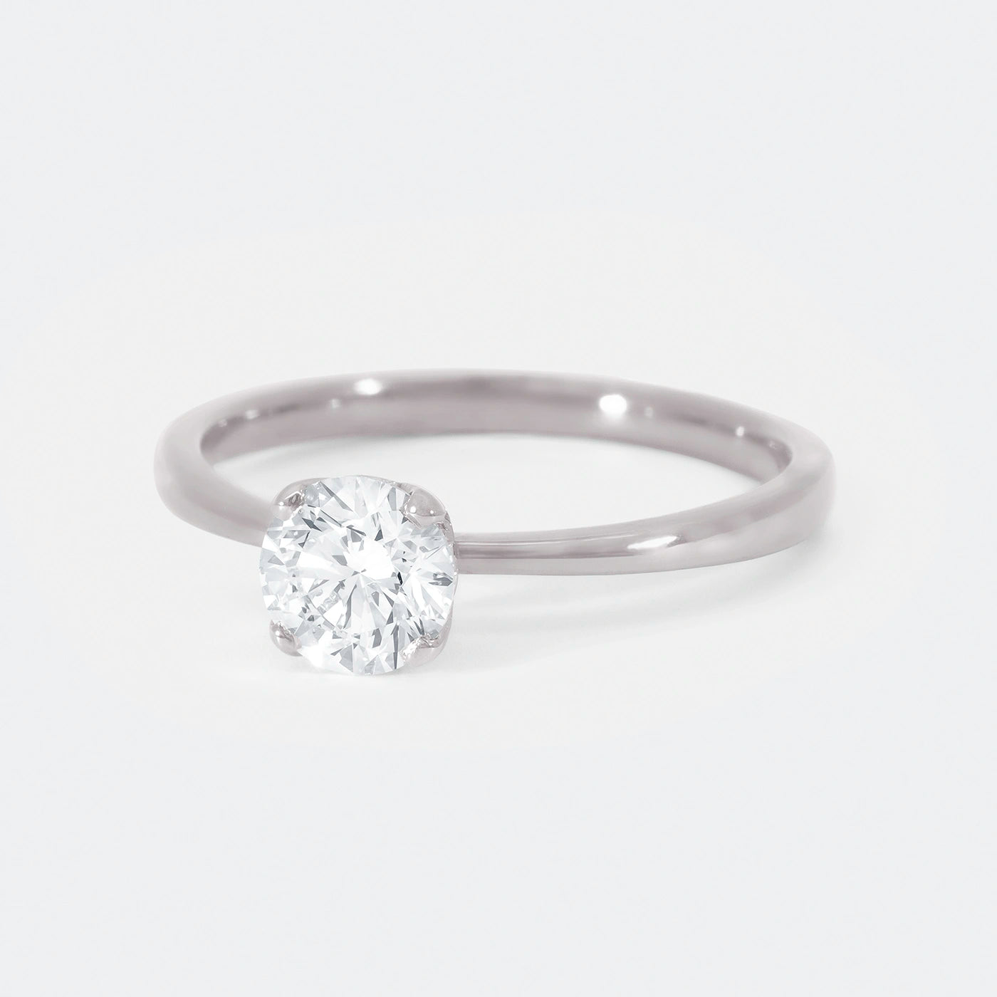 Ring Petite Fleur Solitair Platin 0.75ct Brillant Frontansicht 25Grad links gedreht