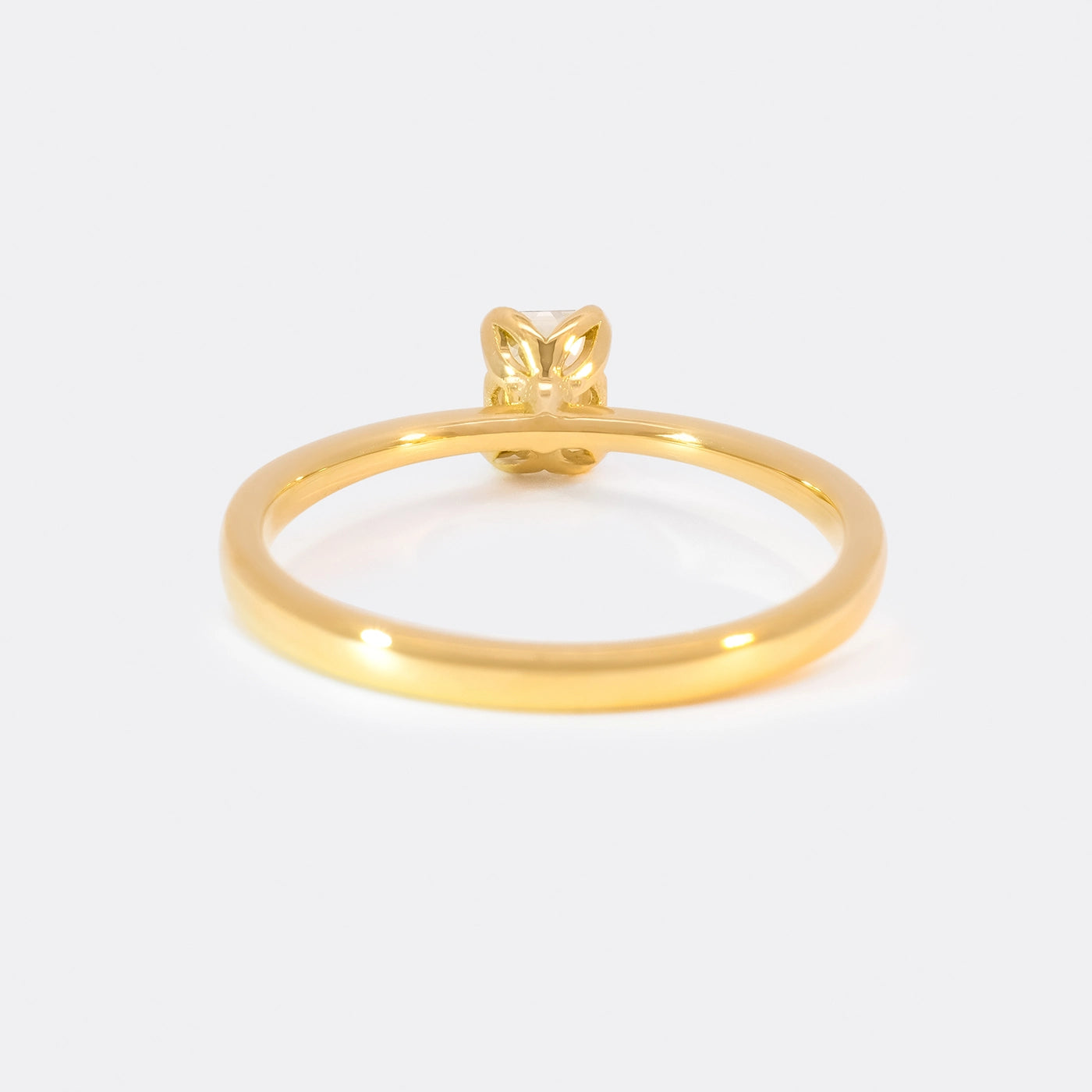 Ring Fleur Solitair ein Baguette Diamant 0.46ct Gelbgold Rueckansicht