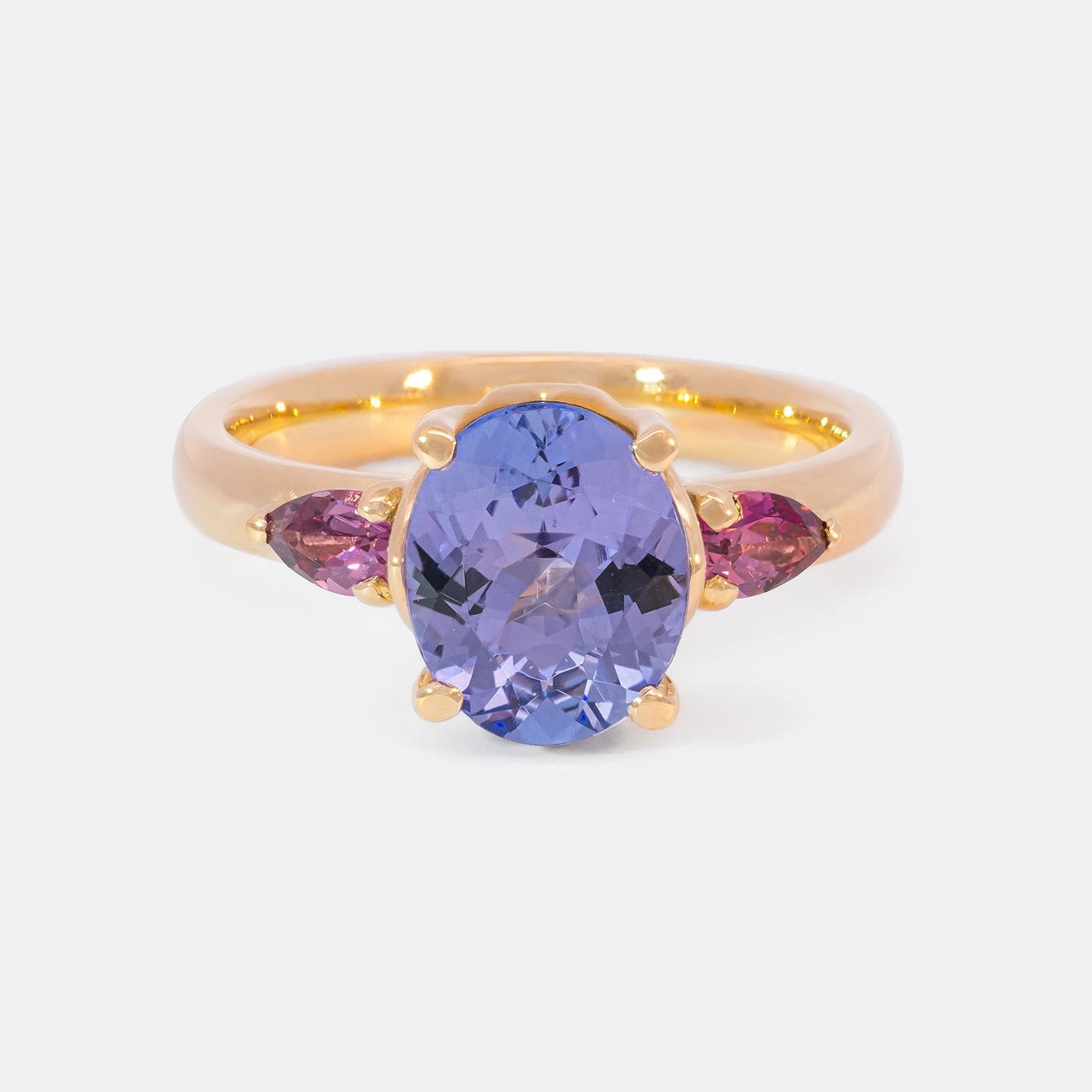 Ring Fleur Unikat blauer Tansanit und zwei magentarote Granate Rosegold  im floralem Design Frontansicht