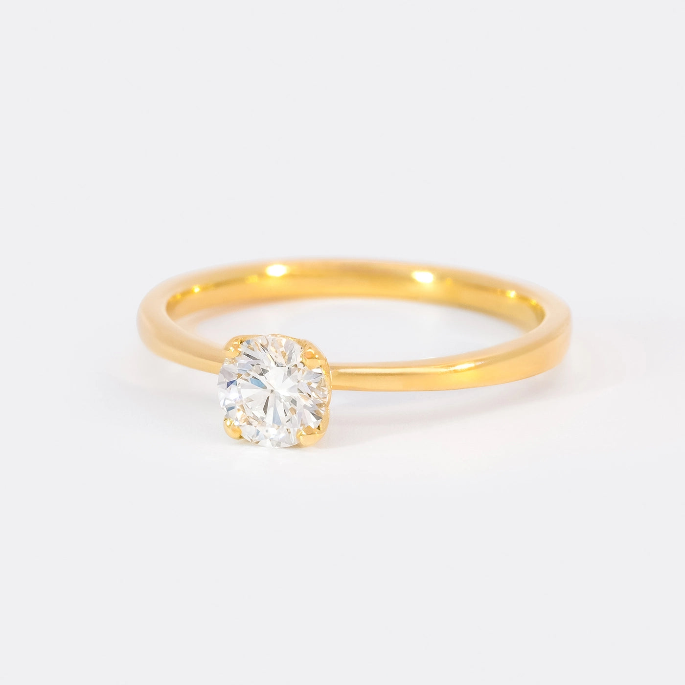 Ring Petite Fleur Solitair 0.50ct Gelbgold Frontansicht 25Grad links gedreht