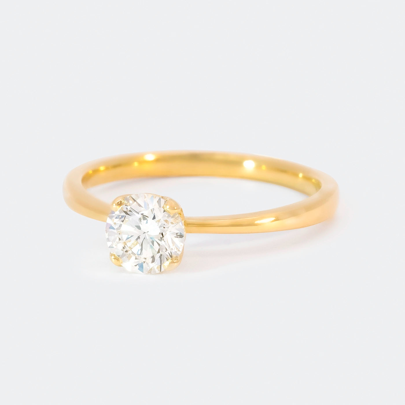 Ring Petite Fleur Solitair Gelbgold 0.75ct Brillant Frontansicht 25Grad links gedreht