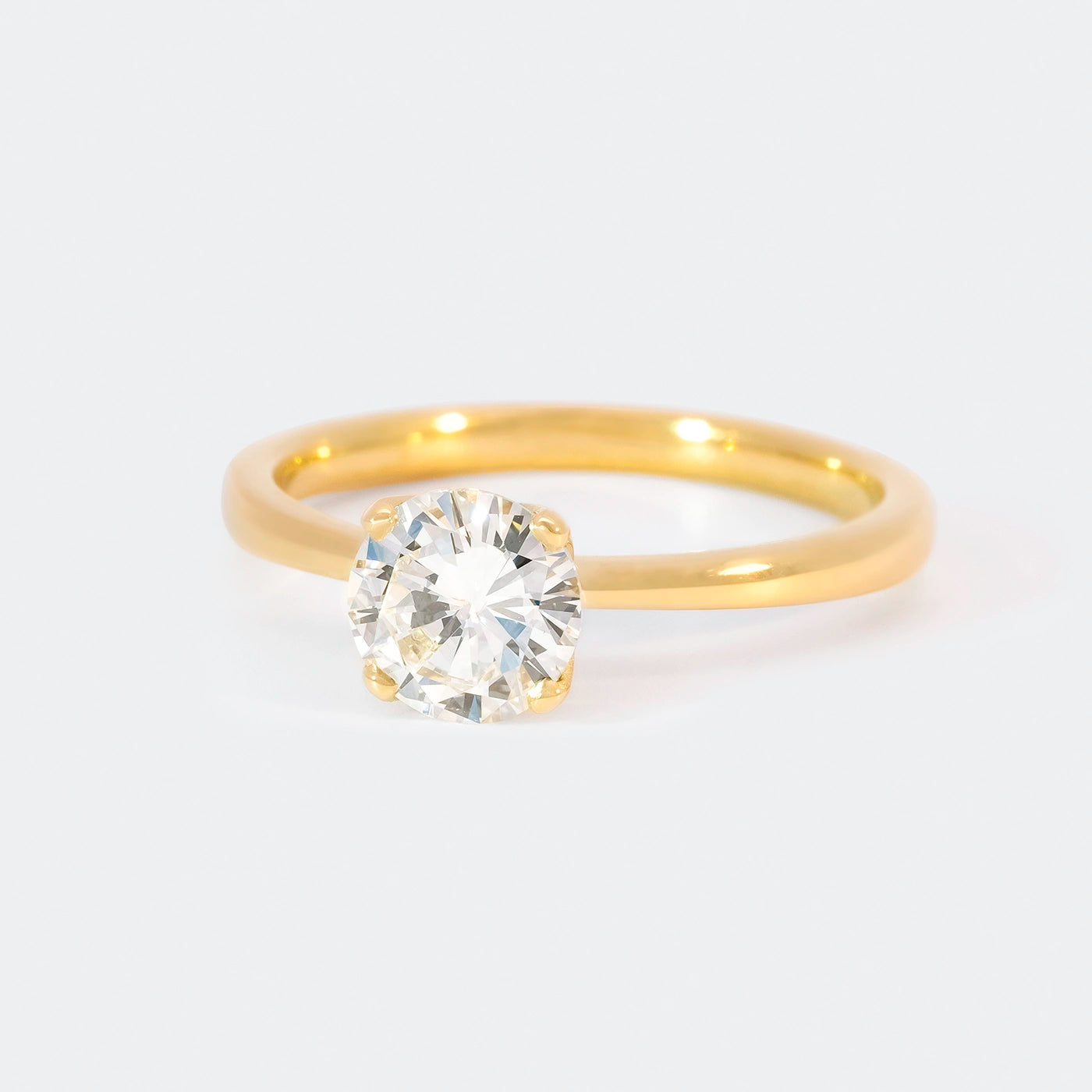 Ring Petite Fleur Solitair 1.00ct Gelbgold Frontansicht 25Grad links gedreht