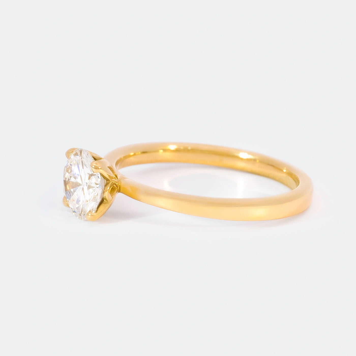 Ring Petite Fleur Solitair 0.50ct Gelbgold Frontansicht 75Grad links gedreht