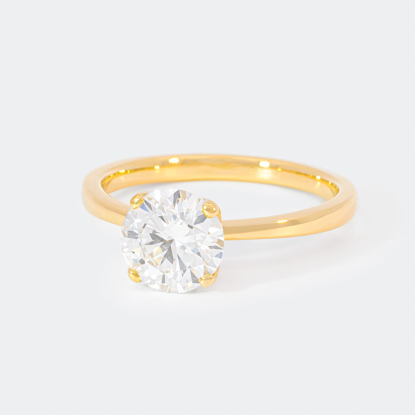 Ring Petite Fleur Solitair Gelbgold 1.50ct Brillant Frontansicht 25Grad links gedreht