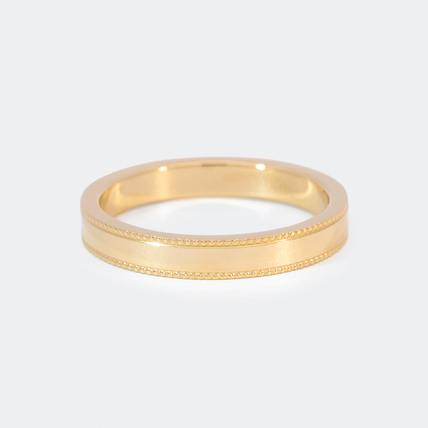 Ring Vintage Damenring Gelbgold Ringschiene mit kleinem Kugelmuster am Rand auf beiden Seiten Frontansicht