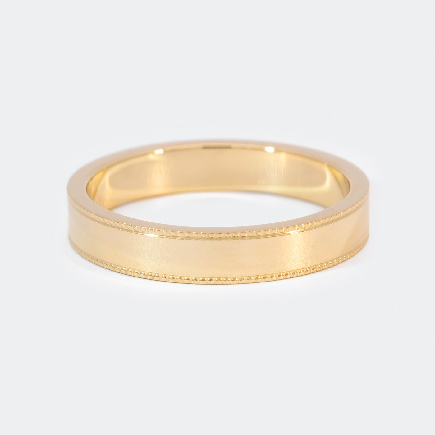 Ring Vintage Herrenring Gelbgold Ringschiene mit kleinem Kugelmuster am Rand auf beiden Seiten Frontansicht